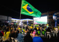 Crianças pintam rua da Cidade da Copa em ação nesta quinta-feira em Campo Grande
